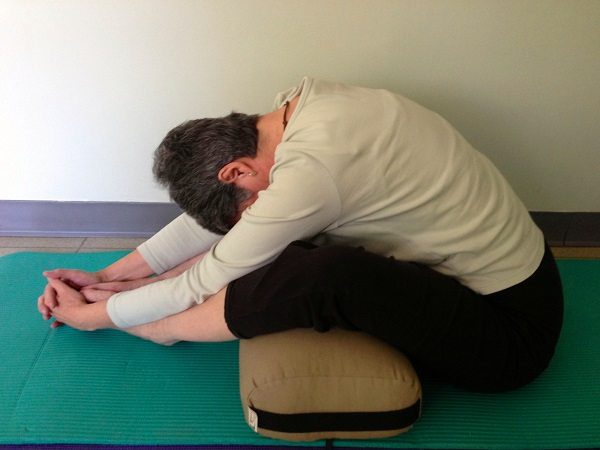 Restorative Yoga: Supported Seated Forward Bend